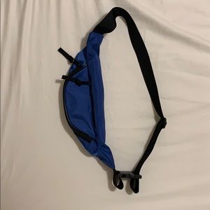 A blue fanny pack bag